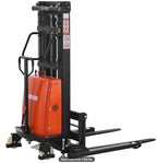 Full electric pallet stacker forklift lifting a 3300 lb pallet load inside a modern warehouse storage facility.