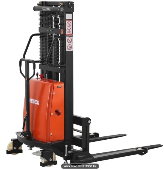 Full electric pallet stacker forklift lifting a 3300 lb pallet load inside a modern warehouse storage facility.