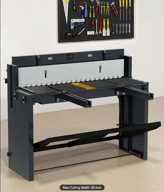 Heavy-duty cutting table with a tool rack in the background