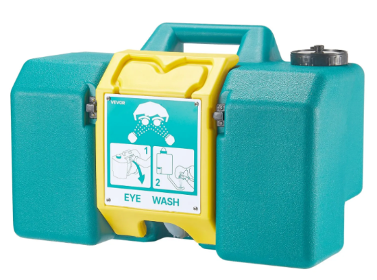 Portable emergency eye wash station positioned inside a warehouse safety area for quick emergency response.