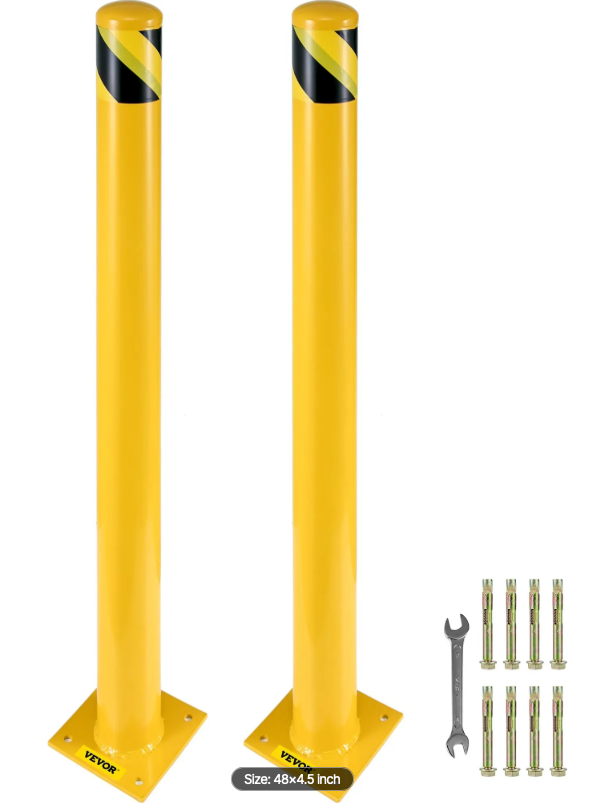 48-inch industrial safety bollard installed at a warehouse entrance to protect doors, walls, and equipment from forklift impacts.