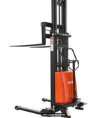 Semi-electric pallet stacker helping operators organize inventory efficiently in a commercial warehouse environment.