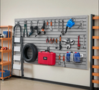 Heavy-duty PVC slat wall paneling used for warehouse storage and organization of tools, supplies, and equipment.